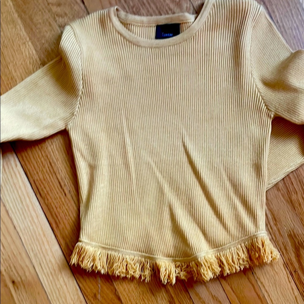 Lumier long sleeve ribbed with fringe.